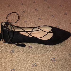 Strappy pointed flats with tassel